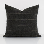 Dark gray pillow with horizontal stripes on a white background
